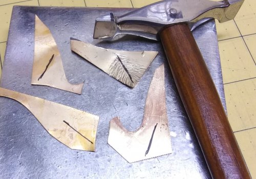 Judy Larson's Making TIny Leaves - , Metalwork, Cutting, Cutting Tool, Cutters, Texturing, Place the metal scrap on a bench block.